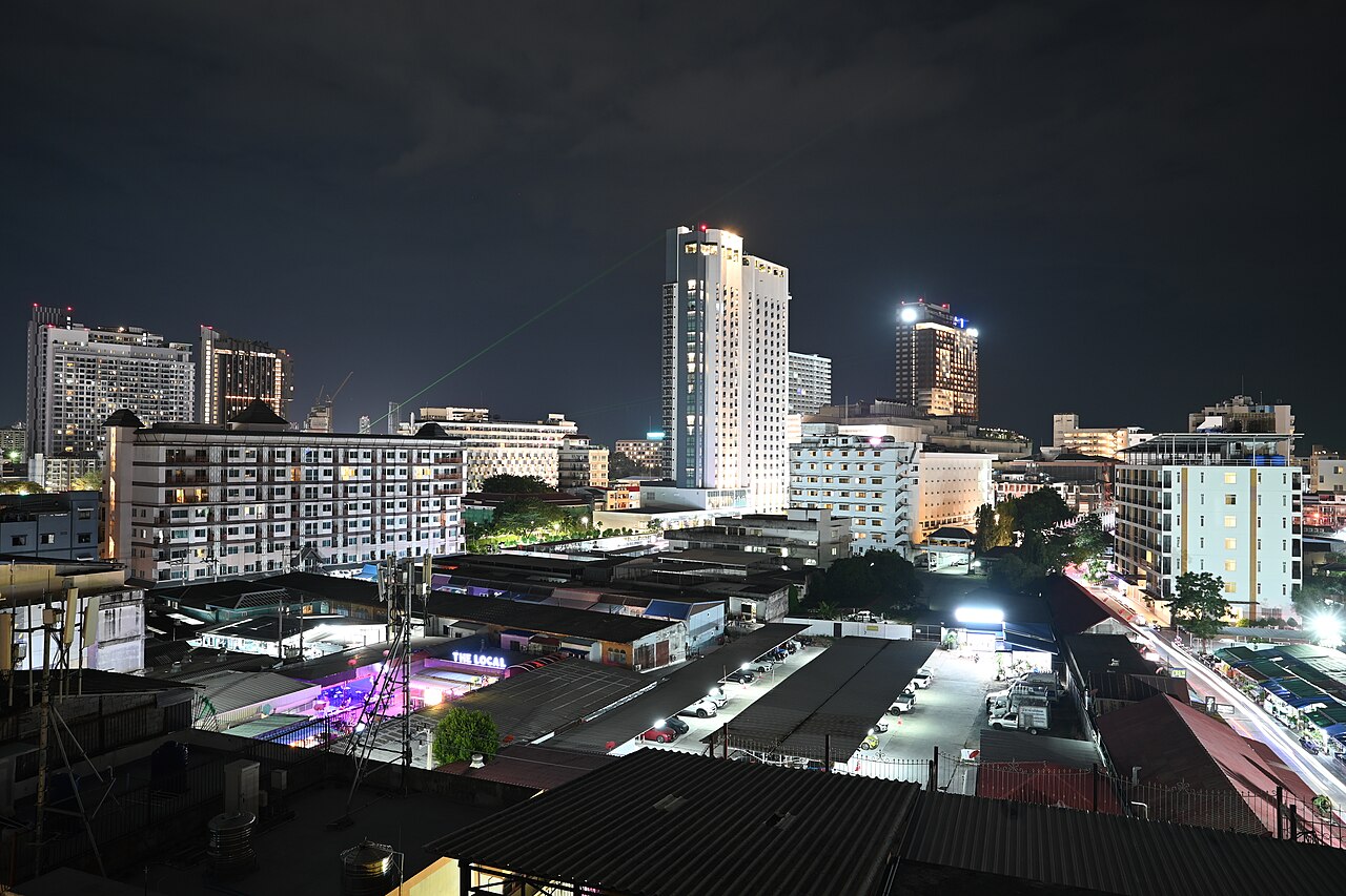 DZ3 0920 Pattaya skyline at night - city lights and high-rises glow over the bustling stre